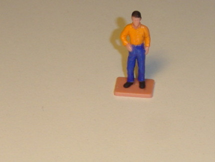 1 Stück Mann stehend, Hemd orange, Hose blau, von Art.-Nr. 1934 / 2542