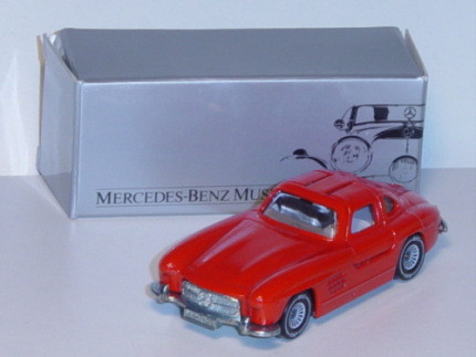 Mercedes-Benz 300 SL (Baureihe W 198), Modell 1954-1957, verkehrsrot, IE grau, Werbeschachtel MERCED