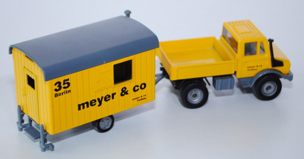 00001 Unimog U 1500 (Baureihe 425, Modell 1975-1988) mit Bauwagen, kadmiumgelb/fehgrau, meier & co /